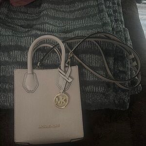 Michael Kors Mercer Extra-Small Pebbled Leather Crossbody Bag light pink